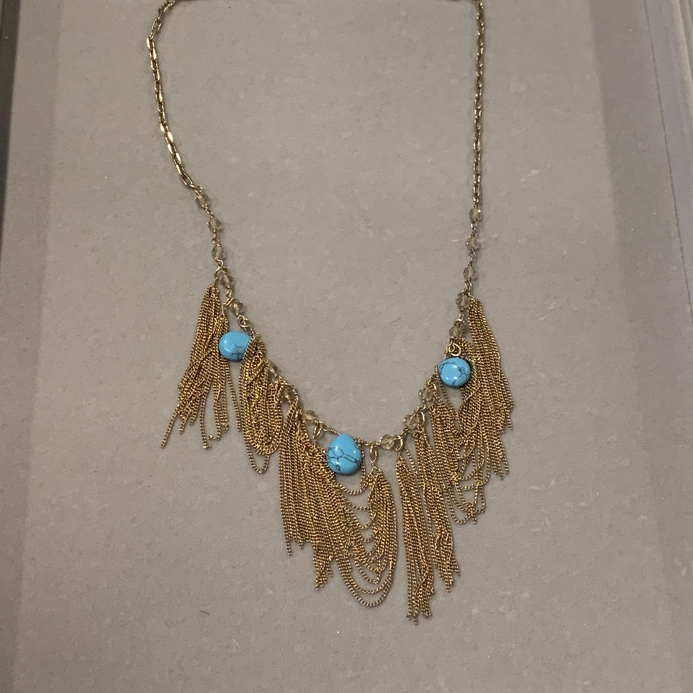 Gold plated necklace with turquoise stones.